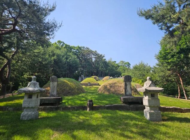 The tomb of Yeonsan-gun in Dobong-gu, Seoul — two modest burial mounds with traditional stone lanterns
