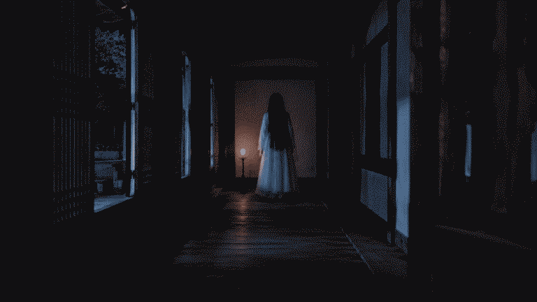 Korean ghost gwishin in white hanbok standing in dark hanok corridor at night