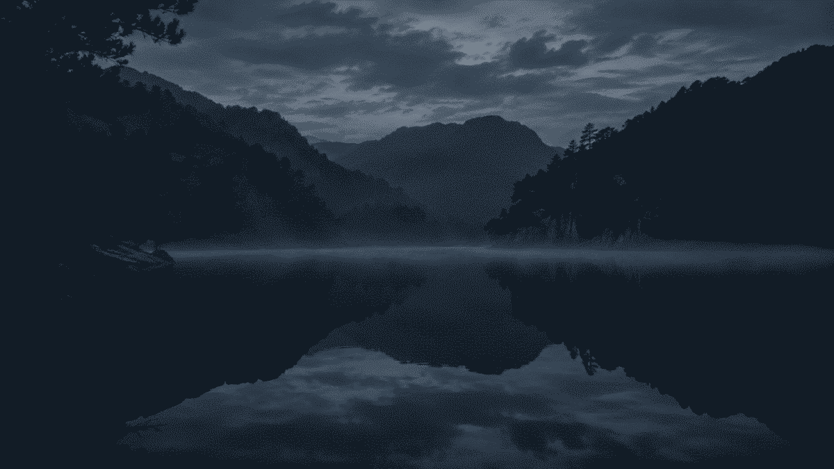 A dark misty Korean lake at dusk evoking the mulgwishin water ghost legend